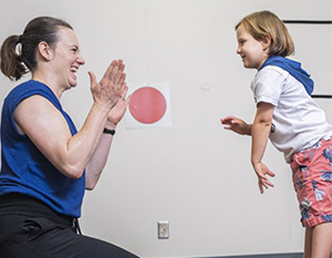 Brittany Travers, PhD, and young study participant